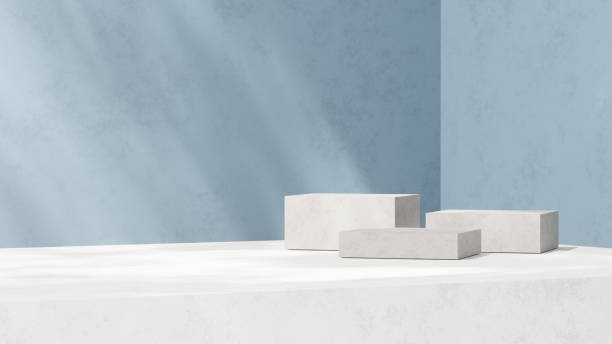 istock 3D background for product display featuring a podium and platform, with a blue backdrop and abstract geometric elements, designed for showcasing merchandise in a landscape orientation. 2191156235