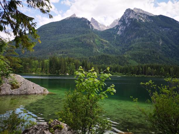 istock Tranquil Lake and Majestic Mountains 2191156292