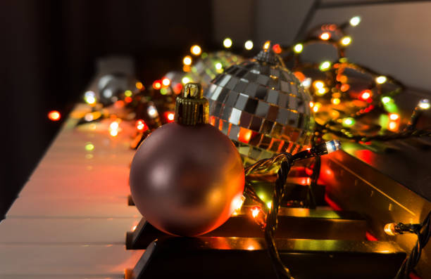 istock Piano keyboard with Christmas decoration, closeup 2191159553