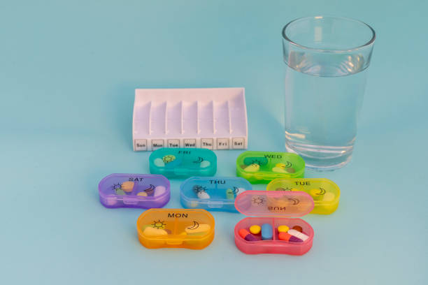 istock Portable travel pill organizer packed with pills and tablets for entire week 2191160246
