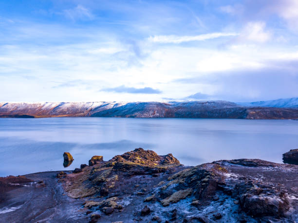 lake road next to kleifarvatn lake in southern iceland. drone point of view.