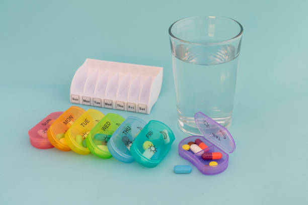 istock Medicine for seven days in a seven plastic boxes on blue background 2191161465