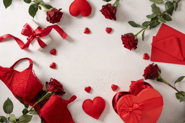 istock Valentine's day frame. Red lace bustier underwear, candy sweets and red roses 2191165416