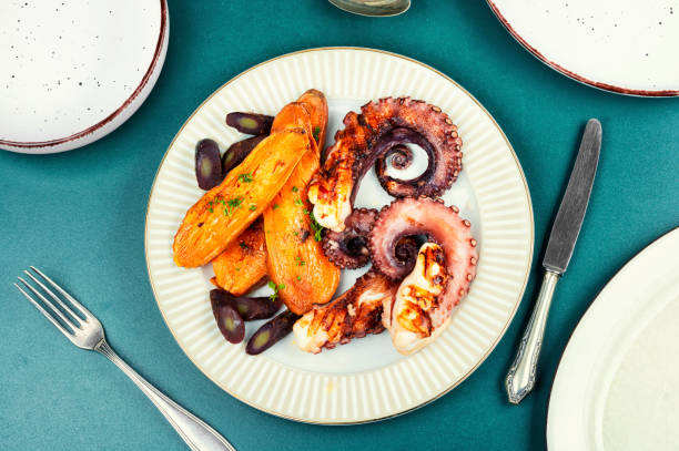 istock Delicious grilled octopus and sweet potato. 2191165942