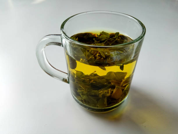 istock Moringa oleifera as herbal tea, inside transparent glass, isolated in white background 2191167727