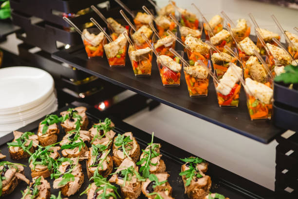 istock A contemporary hotel dining area featuring a sleek buffet setup. 2191170000