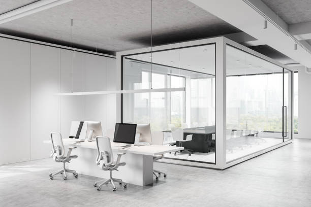 istock Sleek modern office interior with glass-walled meeting room and open workspace, featuring minimalist design and city view. 3D Rendering 2191175796