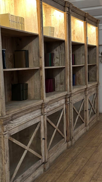 istock The bookcase is made of light wood with lighting. 2191176559