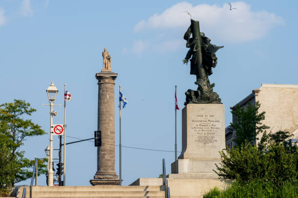 Nelson Monument (Nelson's Column) and Jean Vauquelin Monument in Old Montreal. Quebec, Canada. Nelson Monument (Nelson's Column) and Jean Vauquelin Monument in Old Montreal. Montreal, Quebec, Canada. place jacques cartier stock pictures, royalty-free photos & images