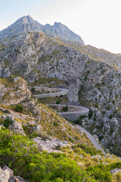 Winding mountain road ascending Sierra de Tramuntana, Mallorca island, Balearic Islands, Mediterranean Sea, Spain