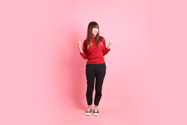 istock 20s woman in red t-shirt 2191183155