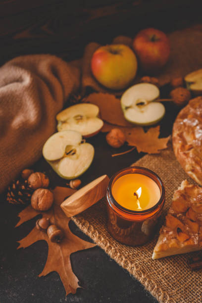 istock Candle and homemade apple pie, autumn mood 2191184539