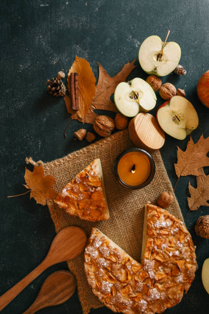 istock Candle and homemade apple pie, autumn mood 2191184625