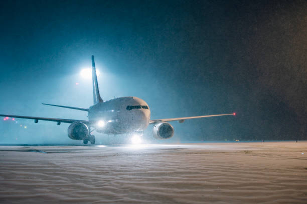 istock Airplane in dense snowfall at airport 2191190287