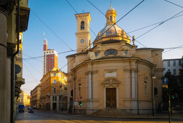 Downtown street in Turin (Italy), church of San Tommaso