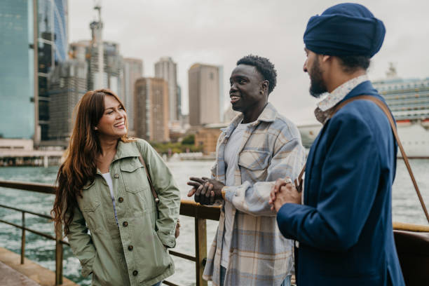 istock Casual conversation among friends by the waterfront 2191192364