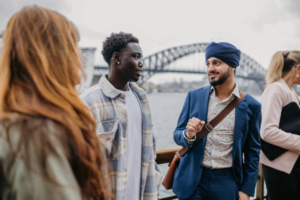 istock Casual conversation with a waterfront city skyline view. 2191192394
