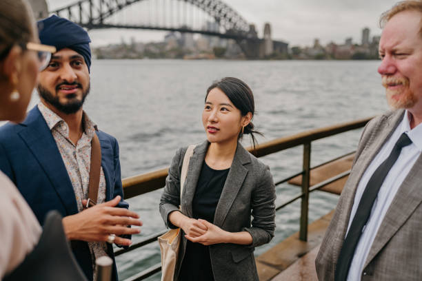 istock Diverse group discussing ideas in front of bridge 2191193231