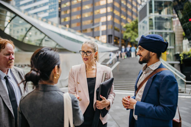 istock Diverse group shares ideas in urban outdoor space. 2191193296