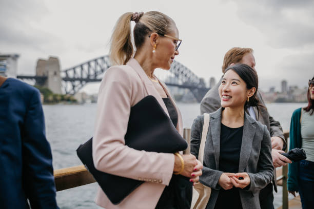 istock Diverse professionals engaged in cheerful conversation 2191193481