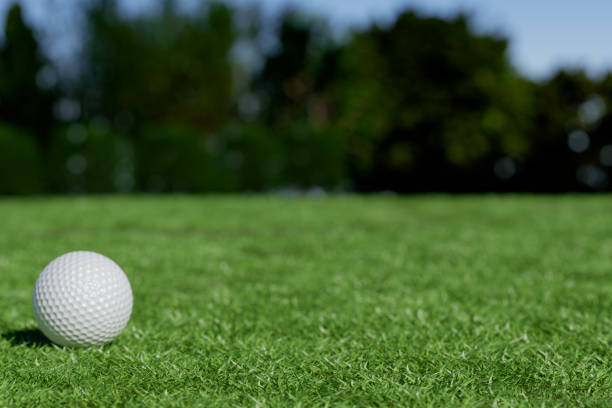 istock A golf ball rests on a lush green lawn under a clear sky. 3d rendering 2191193814