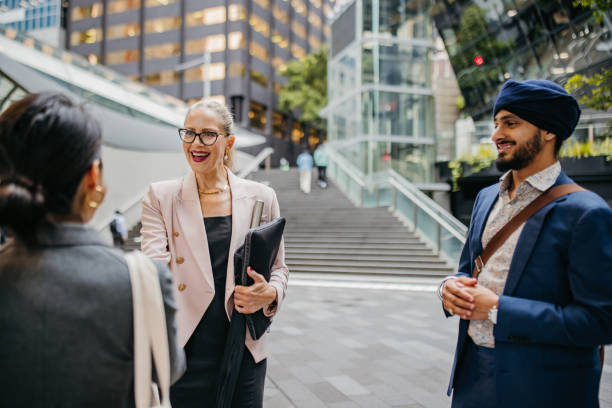 istock Friendly business exchange in bustling city area. 2191194600