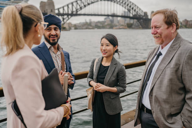 istock Group chat on city waterfront with iconic bridge view 2191194708