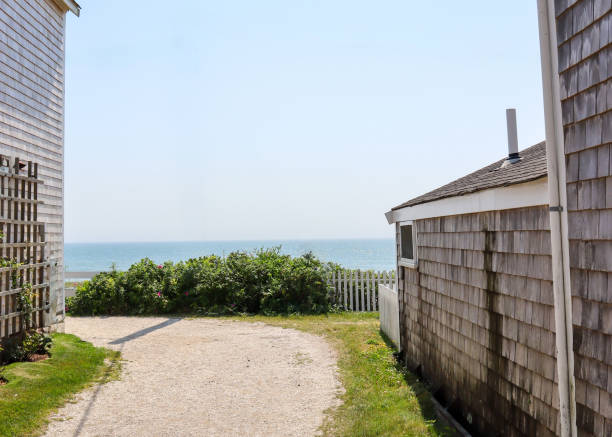 Beautiful houses on a sunny and quiet summer morning near Rockport Harbor, Massachusetts. Rockport is a coastal town in Essex County, Massachusetts, United States.