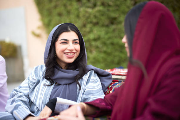 istock In a Riyadh majlis, two friends dressed in traditional clothes engage in a conversation. 2191199194