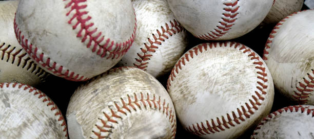 istock Pile or Stack of Baseballs for Playing Games Competition Worn Leather Balls 2191202132