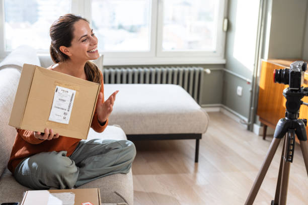 istock A female influencer showcasing her delivery boxes 2191203016