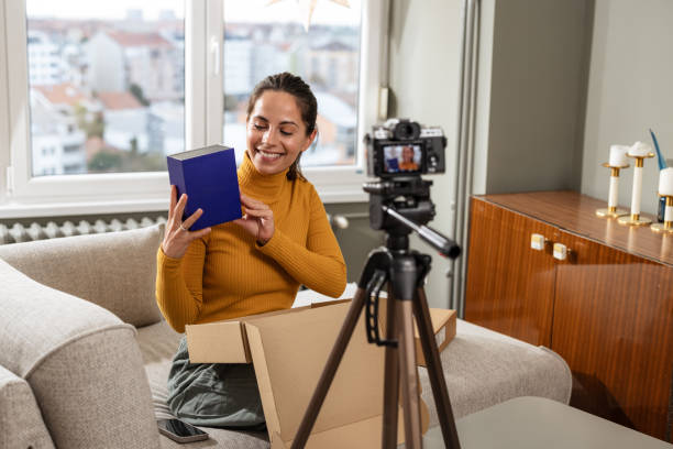 istock A cheerful female influencer sharing shopping tips 2191203045