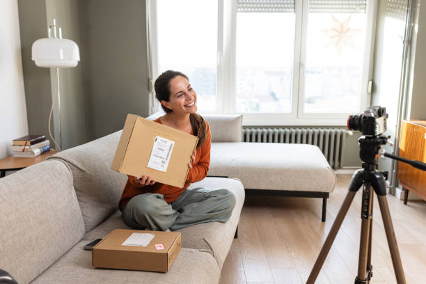 istock Influencer showcasing her online shopping haul 2191203072