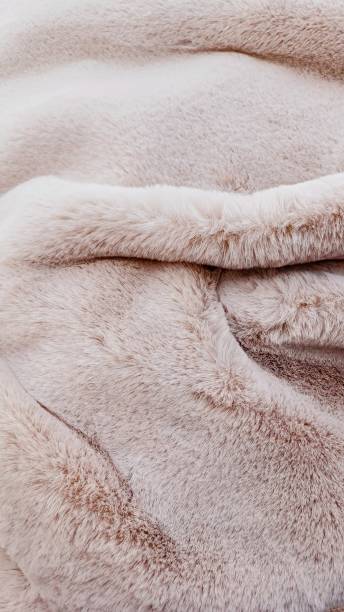 istock pale pink plush soft blanket fabric 2191204473