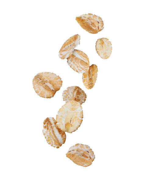 istock Oat flakes levitating in the air close-up isolated on white background 2191209482