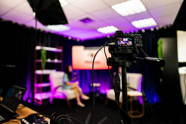 istock Backstage of a podcast studio with people talking 2191212405
