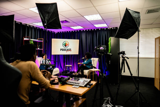 istock Backstage of a podcast studio with people talking 2191212936