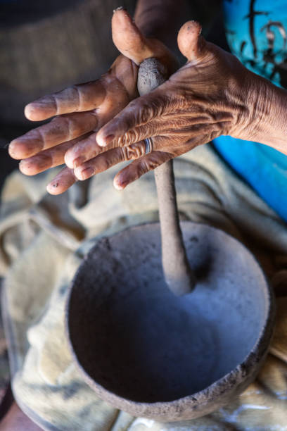 istock Indigenous Marubo woman making a handcraft with clay 2191214005
