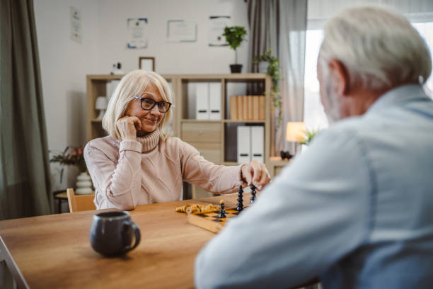 istock senior wife analysis next step while play chess with senior husband 2191218143