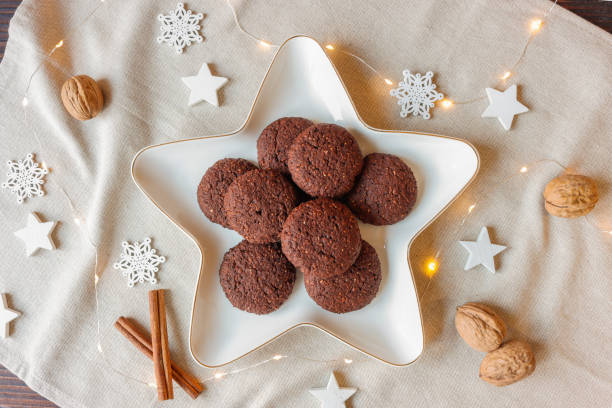 istock Chocolate cookies on a star-shaped plate 2191219634