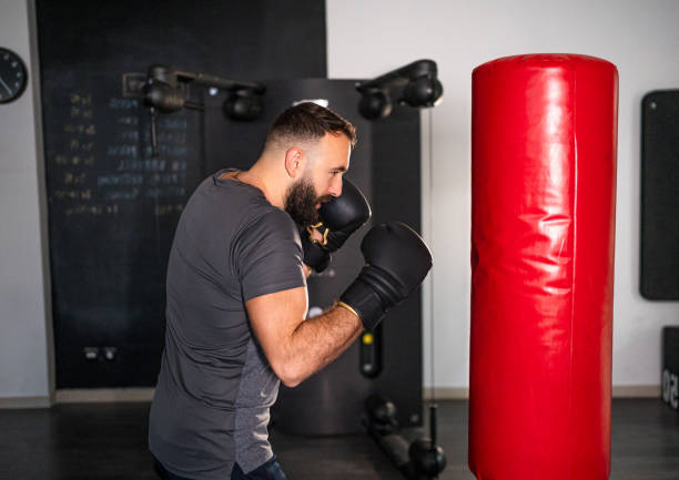 istock Male boxer practicing in the gym 2191220554