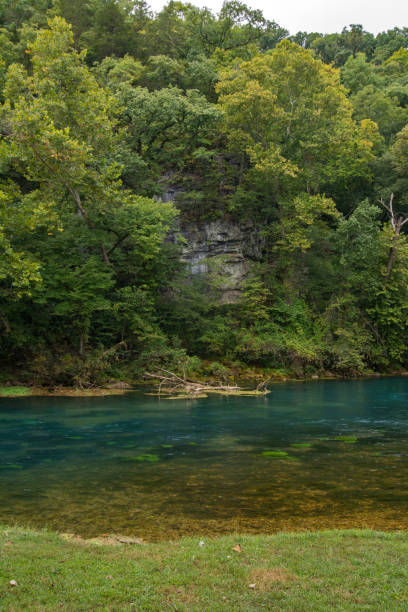 istock Ozark NSR - Big Spring - Rocky Bluff Above the Water 2191222265
