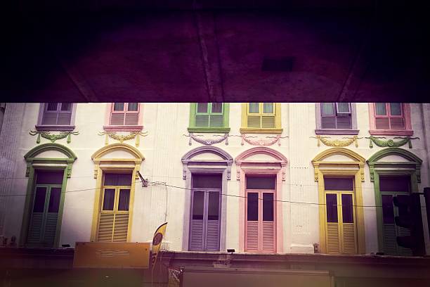 istock Charming Colorful Building Facade with Pastel Windows 2191222969