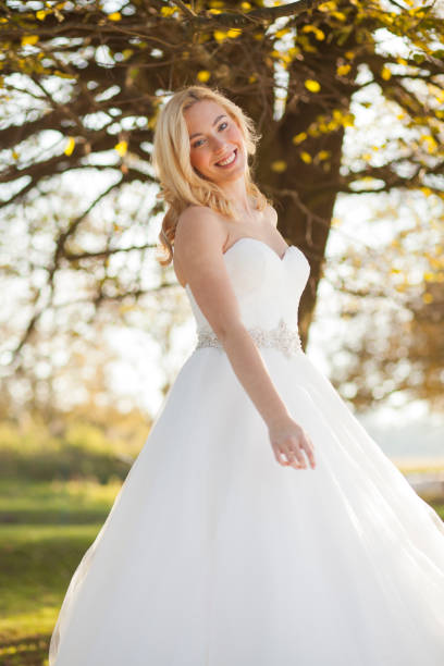 istock Young woman in wedding dress 2191223110