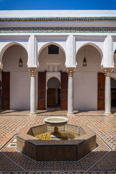 istock serene courtyard with a central fountain surrounded by whitewashed walls 2191223197
