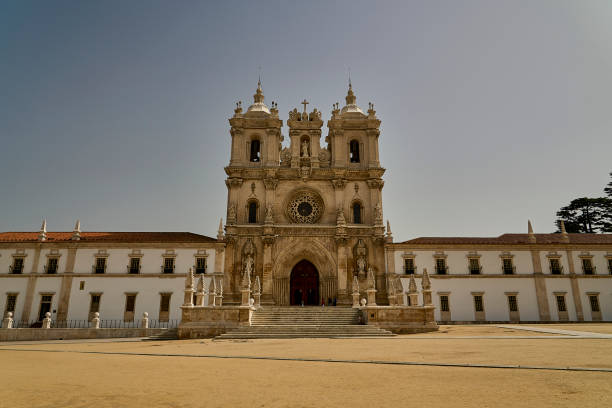 Alcobaca, Portugal - 10 04 2022: exterior of the old historical Cathedral Mosteiro de Santa Maria de Alcobaca, Unesco world heritage.