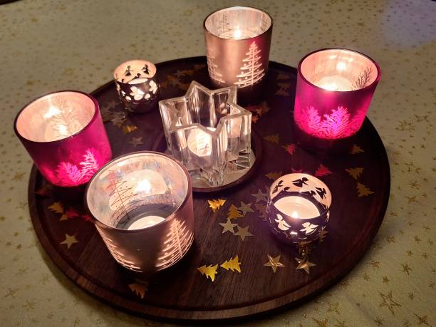 Christmas familie tablet decorations. Candles burning is glas ms ornaments