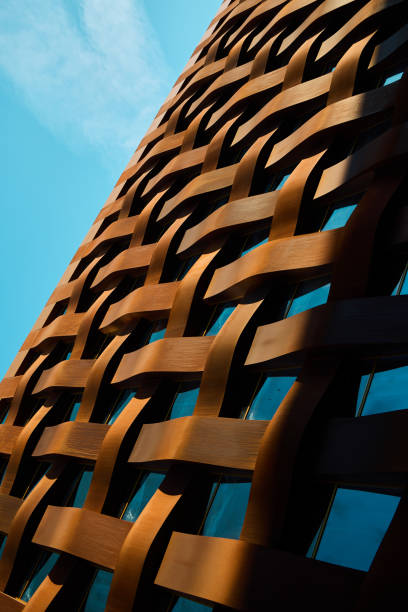 istock An Intricate Woven Metal Structure Set Against a Bright and Clear Blue Sky Above 2191228401