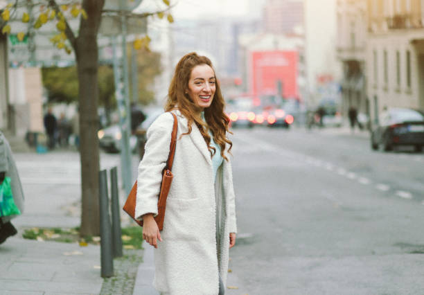 istock Beautiful casual woman walking around 2191228461