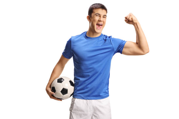 istock Football player celebrating win and holding a ball 2191232841
